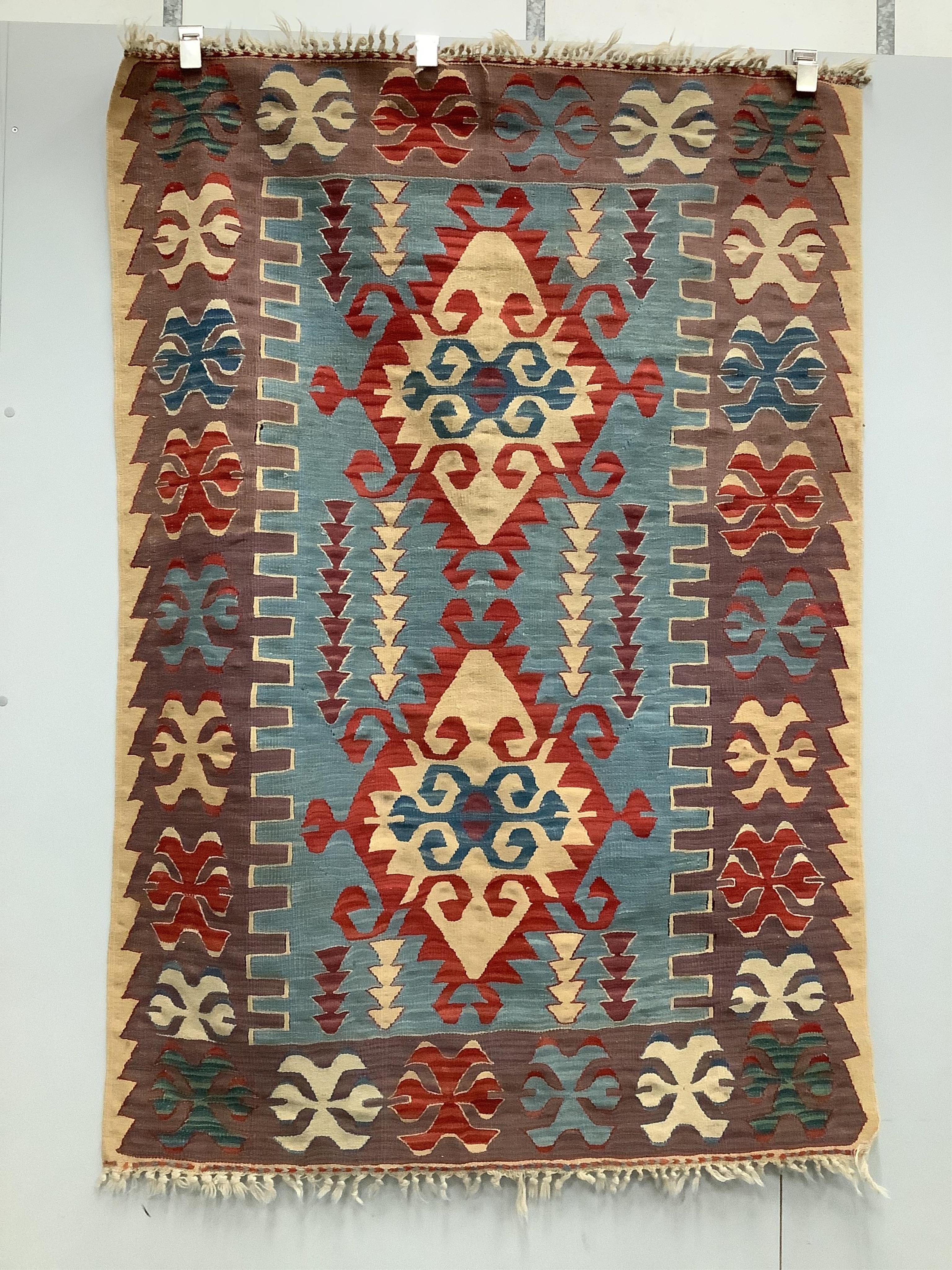 Two Kilim polychrome flatweave rugs, larger 170 x 120cm. Condition - fair